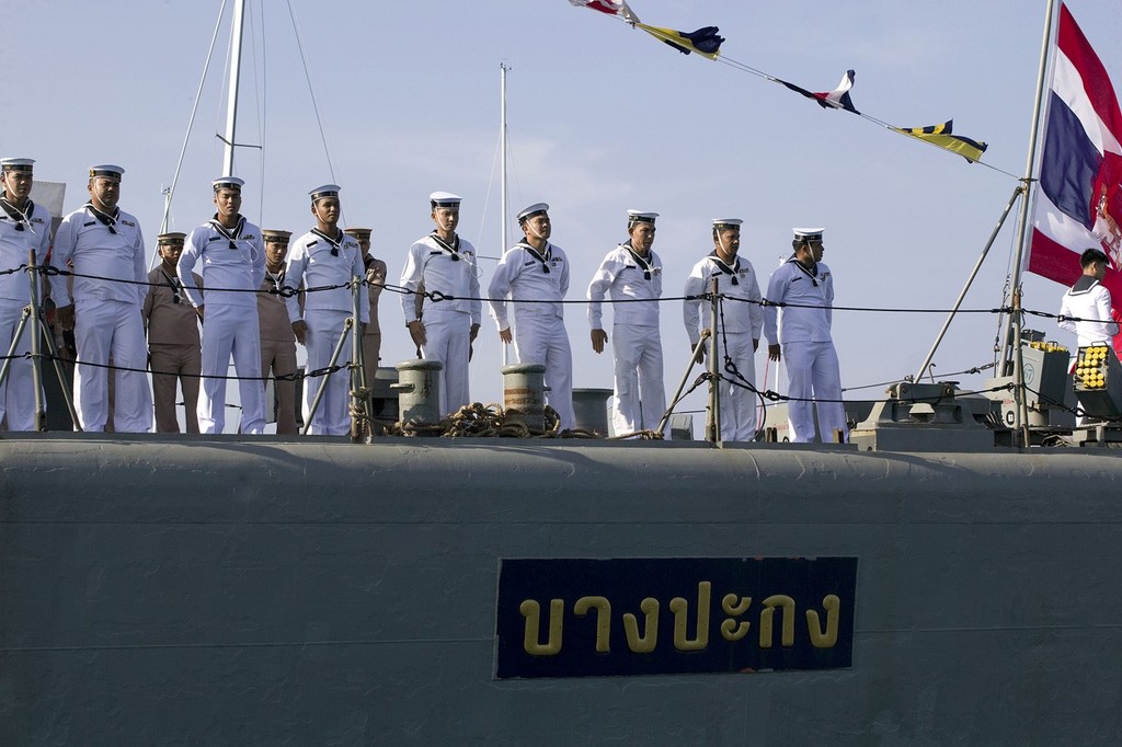 Phuket King’s Cup 2009. Smart as new paint. The Royal Thai Navy takes the salute on board on RTNS Bangpakong. © Guy Nowell